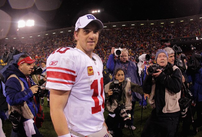 SAN FRANCISCO, CA - JANUARY 22:  Eli Manning #10 of the New York Giants walks off of the field after the Giants won 20-17 in overtime against the San Francisco 49ers during the NFC Championship Game at Candlestick Park on January 22, 2012 in San Francisco, California.  (Photo by Doug Pensinger/Getty Images)
