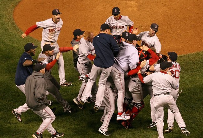 DENVER - OCTOBER 28:  The Boston Red Sox celebrate after defeating the Colorado Rockies in Game Four of the 2007 World Series at Coors Field on October 28, 2007 in Denver, Colorado  The Red Sox defeated the Rockies 4-3 and won the World Series 4-0.  (Photo by Christian Petersen/Getty Images)
