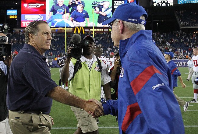 FOXBORO, MA - SEPTEMBER 1:  Bill Belichick of the New England shakes hands with Tom Coughlin of the New York Gianst  after a preseason game at Gillette Stadium on September 1, 2011 in Foxboro, Massachusetts. (Photo by Jim Rogash/Getty Images)