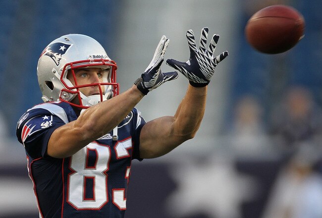 FOXBORO, MA - SEPTEMBER 1:   Wes Welker #83 of the New England Patriots completes a drill before a game with the New York Giants at Gillette Stadium on September 1, 2011 in Foxboro, Massachusetts. (Photo by Jim Rogash/Getty Images)