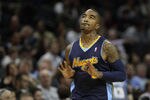 CHARLOTTE, NC - DECEMBER 07:  J.R. Smith #5 of the Denver Nuggets celebrates after making a basket against the Charlotte Bobcats during their game at Time Warner Cable Arena on December 7, 2010 in Charlotte, North Carolina.  NOTE TO USER: User expressly acknowledges and agrees that, by downloading and/or using this Photograph, User is consenting to the terms and conditions of the Getty Images License Agreement.  (Photo by Streeter Lecka/Getty Images)