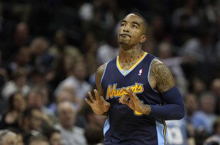 CHARLOTTE, NC - DECEMBER 07:  J.R. Smith #5 of the Denver Nuggets celebrates after making a basket against the Charlotte Bobcats during their game at Time Warner Cable Arena on December 7, 2010 in Charlotte, North Carolina.  NOTE TO USER: User expressly acknowledges and agrees that, by downloading and/or using this Photograph, User is consenting to the terms and conditions of the Getty Images License Agreement.  (Photo by Streeter Lecka/Getty Images)