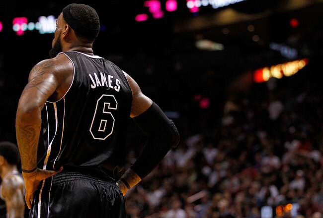 MIAMI, FL - JANUARY 29:  LeBron James #6 of the Miami Heat looks on during a game against the Chicago Bulls at American Airlines Arena on January 29, 2012 in Miami, Florida. NOTE TO USER: User expressly acknowledges and agrees that, by downloading and/or using this Photograph, User is consenting to the terms and conditions of the Getty Images License Agreement.  (Photo by Mike Ehrmann/Getty Images)