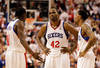 PHILADELPHIA, PA - APRIL 21: Elton Brand #42 of the Philadelphia 76ers talks with teammates Jrue Holiday #11 (L) and Lou Williams #23 (R)  during the closing moments of their game against the Miami Heat during game three of the Eastern Conference Quarterfinals at Wells Fargo Center on April 21, 2011 in Philadelphia, Pennsylvania.NOTE TO USER: User expressly acknowledges and agrees that, by downloading and/or using this Photograph, User is consenting to the terms and conditions of the Getty Images License Agreement.  (Photo by Rob Carr/Getty Images)