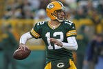 GREEN BAY, WI - DECEMBER 11: Aaron Rodgers #12 of the Green Bay Packers throws a pass against the Oakland Raiders at Lambeau Field on December 11, 2011 in Green Bay, Wisconsin. (Photo by Jonathan Daniel/Getty Images)