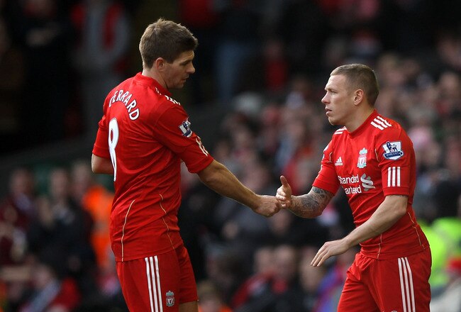 LIVERPOOL, ENGLAND - JANUARY 28:  Steven Gerrard of Liverpool is replaced by Craig Bellamy (R) during the FA Cup Fourth Round match between Liverpool and Manchester United at Anfield on January 28, 2012 in Liverpool, England. (Photo by Alex Livesey/Getty Images)