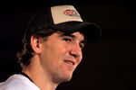 INDIANAPOLIS, IN - FEBRUARY 02:  Eli Manning #10 of the New York Giants answers questions from the press during a media availability session for Super Bowl XLVI at the Indianapolis Downtown Marriott on February 2, 2012 in Indianapolis, Indiana.  (Photo by Scott Halleran/Getty Images)