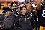 TEMPE, AZ - DECEMBER 28:  Head coach Kirk Ferentz (C) of the Iowa Hawkeyes celebrates with teammates after defeating the Missouri Tigers in the Insight Bowl at Sun Devil Stadium on December 28, 2010 in Tempe, Arizona.  The Hawkeyes defeated the Tigers 27-24.  (Photo by Christian Petersen/Getty Images)