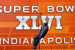 INDIANAPOLIS, IN - FEBRUARY 03:  Fans ride zip lines while they attend the Super Bowl XLVI NFL Experience presented by GMC at the Indiana Convention Center on February 3, 2012 in Indianapolis, Indiana. The New England Patriots will play the New York Giants in Super Bowl XLVI on February 5, 2011 at Lucas Oil Stadium in Indianapolis, Indiana.  (Photo by Win McNamee/Getty Images)