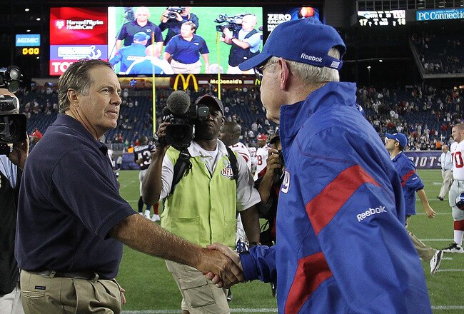FOXBORO, MA - SEPTEMBER 1:  Bill Belichick of the New England shakes hands with Tom Coughlin of the New York Gianst  after a preseason game at Gillette Stadium on September 1, 2011 in Foxboro, Massachusetts. (Photo by Jim Rogash/Getty Images)