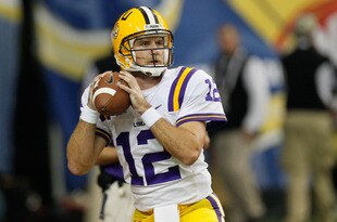 ATLANTA, GA - DECEMBER 03:  Quarterback Jarrett Lee #12 of the LSU Tigers warms up against the Georgia Bulldogs prior to the 2011 SEC Conference Championship at  Georgia Dome on December 3, 2011 in Atlanta, Georgia.  (Photo by Kevin C. Cox/Getty Images)