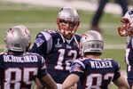 INDIANAPOLIS, IN - FEBRUARY 05:  Tom Brady #12 of the New England Patriots works with his receivers on the field before the New England Patriots take on the New York Giants in Super Bowl XLVI at Lucas Oil Stadium on February 5, 2012 in Indianapolis, Indiana.  (Photo by Jeff Gross/Getty Images)