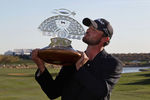 SCOTTSDALE, AZ - FEBRUARY 05:  Kyle Stanley kisses the trophy after winning the Waste Management Phoenix Open at TPC Scottsdale on February 5, 2012 in Scottsdale, Arizona.  (Photo by Christian Petersen/Getty Images)