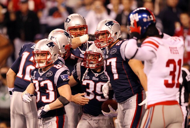 INDIANAPOLIS, IN - FEBRUARY 05:  Running back Danny Woodhead #39 of the New England Patriots celebrates his four-yard touchdown in the second quarter against the New York Giants during Super Bowl XLVI at Lucas Oil Stadium on February 5, 2012 in Indianapolis, Indiana.  (Photo by Ezra Shaw/Getty Images)