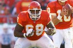 25 Nov 2001 : Will Shields #68 of the Kansas City Chiefs awaits his turn as quarterback Trent Dilfer #10 calls the play during the game against the Seattle Seahawks at Arrowhead Stadium in Kansas City, Missouri.  The Chiefs won 19-7. DIGITAL IMAGE. Mandatory Credit: Brian Bahr/Allsport