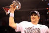 INDIANAPOLIS, IN - FEBRUARY 05:  Quarterback Eli Manning #10 of the New York Giants poses with the Vince Lombardi Trophy after the Giants defeated the Patriots by a score of 21-17 in Super Bowl XLVI at Lucas Oil Stadium on February 5, 2012 in Indianapolis, Indiana.  (Photo by Ezra Shaw/Getty Images)