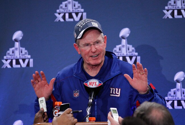 INDIANAPOLIS, IN - FEBRUARY 05:  Head coach Tom Coughlin of the New York Giants talks with the media in a post game press conference after defeating the New England Patriots 21-17 during Super Bowl XLVI at Lucas Oil Stadium on February 5, 2012 in Indianapolis, Indiana.  (Photo by Rob Carr/Getty Images)