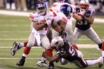 INDIANAPOLIS, IN - FEBRUARY 05:  Runningback Ahmad Bradshaw #44 of the New York Giants runs the ball in the first quarter against the New England Patriots during Super Bowl XLVI at Lucas Oil Stadium on February 5, 2012 in Indianapolis, Indiana.  (Photo by Andy Lyons/Getty Images)