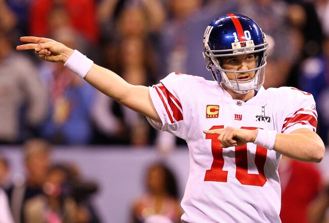 INDIANAPOLIS, IN - FEBRUARY 05:  Eli Manning #10 of the New York Giants reacts in the first half while taking on the New England Patriots during Super Bowl XLVI at Lucas Oil Stadium on February 5, 2012 in Indianapolis, Indiana. Manning, named MVP, led the Giants to a 21-17 victory.  (Photo by Al Bello/Getty Images)