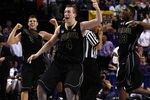 PORTLAND, OR - MARCH 21:  (C) Robbie Hummel #4 of the Purdue Boilermakers along with (L) Chris Kramer #3 and (R) E'Twaun Moore #33 celebrate after defeating the Washington Huskies during the second round of the NCAA Division I Men's Basketball Tournament at the Rose Garden on March 21, 2009 in Portland, Oregon. The Boilermakers defeated the Huskies 76-74 to advance to the Sweet 16.  (Photo by Jonathan Ferrey/Getty Images)