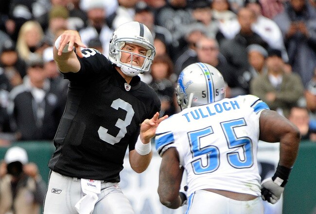 OAKLAND, CA - DECEMBER 18: Carson Palmer #3 of the Oakland Raiders throws a pass under presure from Stephen Tulloch #55 of the Detroit Lions at O.co Coliseum on December 18, 2011 in Oakland, California.  (Photo by Thearon W. Henderson/Getty Images)