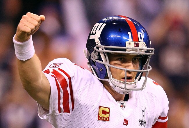INDIANAPOLIS, IN - FEBRUARY 05:  Eli Manning #10 of the New York Giants reacts in the first half while taking on the New England Patriots during Super Bowl XLVI at Lucas Oil Stadium on February 5, 2012 in Indianapolis, Indiana. Manning, named MVP, led the Giants to a 21-17 victory.  (Photo by Al Bello/Getty Images)