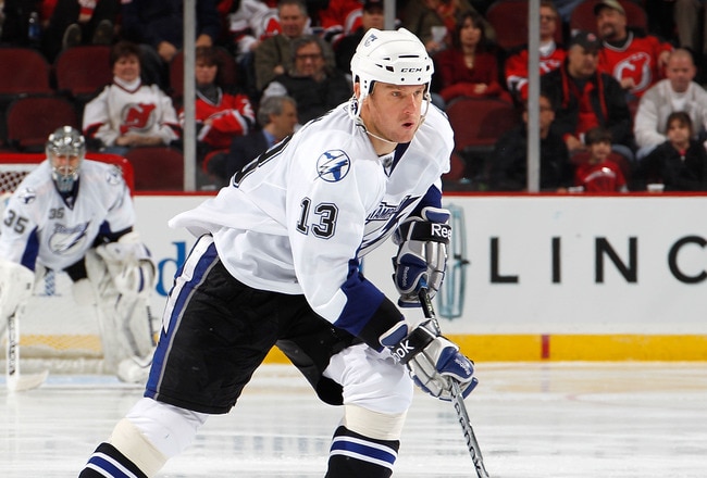 NEWARK, NJ - MARCH 02:  Pavel Kubina #13 of the Tampa Bay Lightning skates during an NHL hockey game against the New Jersey Devils at the Prudential Center on March 2, 2011 in Newark, New Jersey.  (Photo by Paul Bereswill/Getty Images)