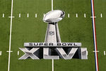 INDIANAPOLIS, IN - FEBRUARY 05:  A detail of the official Super Bowl XLVI logo painted on the field during Super Bowl XLVI between the New York Giants and the New England Patriots at Lucas Oil Stadium on February 5, 2012 in Indianapolis, Indiana.  (Photo by Andy Lyons/Getty Images)