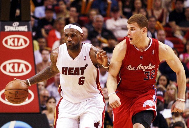 MIAMI - FEBRUARY 06:  Forward LeBron James #6 of the Miami Heat drives against guard Forward Blake Griffin #32 of the L.A. Clippers at American Airlines Arena on February 6, 2011 in Miami, Florida. NOTE TO USER: User expressly acknowledges and agrees that, by downloading and or using this photograph, User is consenting to the terms and conditions of the Getty Images License Agreement.  (Photo by Marc Serota/Getty Images)