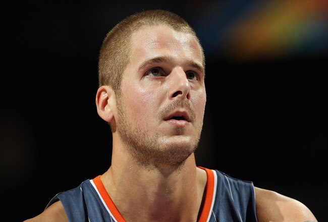 DENVER, CO - MARCH 02:  Joel Pryzbilla #10 of the Charlotte Bobcats takes a free throw against the Denver Nuggets at the Pepsi Center on March 2, 2011 in Denver, Colorado. The Nuggets defeated the Bobcats 120-80.NOTE TO USER: User expressly acknowledges and agrees that, by downloading and or using this photograph, User is consenting to the terms and conditions of the Getty Images License Agreement.  (Photo by Doug Pensinger/Getty Images)