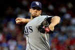 ARLINGTON, TX - OCTOBER 01:  James Shields #33 of the Tampa Bay Rays throws against the Texas Rangers during Game Two of the American League Division Series at Rangers Ballpark in Arlington on September 30, 2011 in Arlington, Texas.  (Photo by Ronald Martinez/Getty Images)