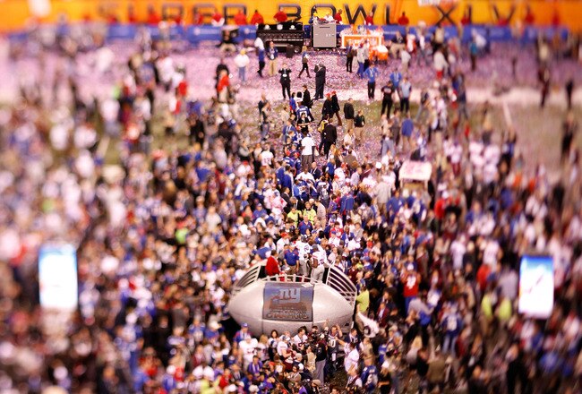 INDIANAPOLIS, IN - FEBRUARY 05:  (***EDITORS NOTE*** - THIS DIGITAL IMAGE WAS CREATED WITH THE USE OF VARIABLE FOCAL PLANE LENS) The Vince Lombardi Trophy is presented to the New York Giants after the Giants defeated the Patriots by a score of 21-17 in Super Bowl XLVI at Lucas Oil Stadium on February 5, 2012 in Indianapolis, Indiana.  (Photo by Gregory Shamus/Getty Images)