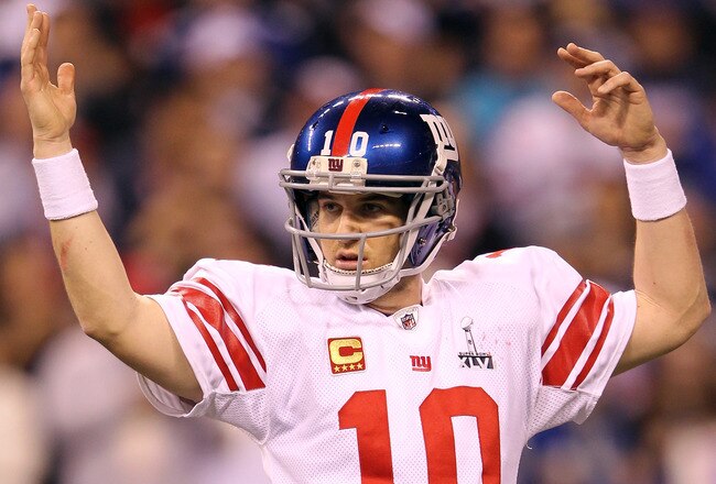 INDIANAPOLIS, IN - FEBRUARY 05:  Eli Manning #10 of the New York Giants reacts against the New England Patriots during Super Bowl XLVI at Lucas Oil Stadium on February 5, 2012 in Indianapolis, Indiana.  (Photo by Jamie Squire/Getty Images)
