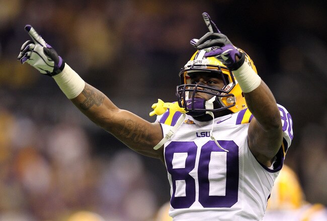 NEW ORLEANS, LA - JANUARY 09:  Jarvis Landry #80 of the Louisiana State University Tigers points while playing against the Alabama Crimson Tide during the 2012 Allstate BCS National Championship Game at Mercedes-Benz Superdome on January 9, 2012 in New Orleans, Louisiana.  (Photo by Andy Lyons/Getty Images)