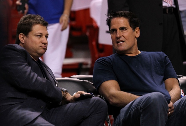 MIAMI, FL - JUNE 12:  (L-R) ESPN writer Marc Stein sits with owner Mark Cuban of the Dallas Mavericks courtside before Game Six of the 2011 NBA Finals against the Miami Heat at American Airlines Arena on June 12, 2011 in Miami, Florida. NOTE TO USER: User expressly acknowledges and agrees that, by downloading and/or using this Photograph, user is consenting to the terms and conditions of the Getty Images License Agreement.  (Photo by Ronald Martinez/Getty Images)