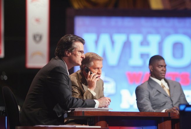 NEW YORK - APRIL 28:  Mel Kiper, Chris Mortensen and Keyshawn Johnson broadcast for ESPN during the 2007 NFL Draft on April 28, 2007 at Radio City Music Hall in New York, New York. (Photo by Chris McGrath/Getty Images)