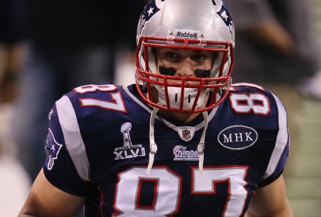 INDIANAPOLIS, IN - FEBRUARY 05:  Rob Gronkowski #87 of the New England Patriots runs on the field before the New England Patriots take on the New York Giants in Super Bowl XLVI at Lucas Oil Stadium on February 5, 2012 in Indianapolis, Indiana.  (Photo by Jeff Gross/Getty Images)