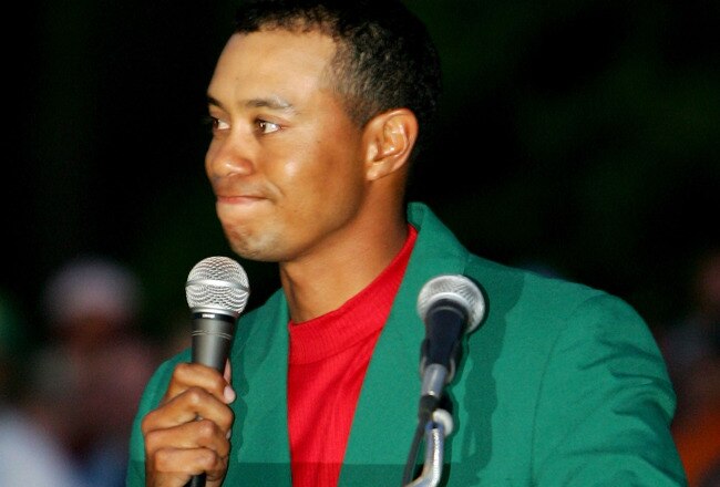 AUGUSTA, GA - APRIL 10:  An emotional Tiger Woods speaks at the podium after receiving the green jacket and winning The Masters at the Augusta National Golf Club on April 10, 2005 in Augusta, Georgia.  (Photo by David Cannon/Getty Images)