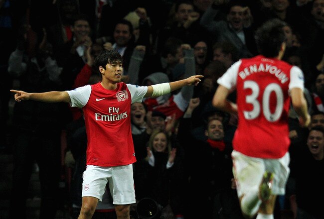 LONDON, ENGLAND - OCTOBER 25:  Park Chu-Young of Arsenal is congratulated by team mates after scoring his teams second goal of the game during the Carling Cup Fourth Round match between Arsenal and Bolton Wanderers at Emirates Stadium on October 25, 2011 in London, England.  (Photo by Dean Mouhtaropoulos/Getty Images)