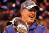 INDIANAPOLIS, IN - FEBRUARY 05:  Head coach Tom Coughlin of the New York Giants celebrates with the Vince Lombardi Trophy after defeating the New England Patriots in Super Bowl XLVI at Lucas Oil Stadium on February 5, 2012 in Indianapolis, Indiana. The New York Giants defeated the New England Patriots 21-17.  (Photo by Jamie Squire/Getty Images)