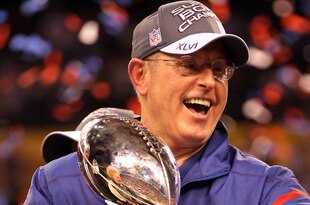 INDIANAPOLIS, IN - FEBRUARY 05:  Head coach Tom Coughlin of the New York Giants celebrates with the Vince Lombardi Trophy after defeating the New England Patriots in Super Bowl XLVI at Lucas Oil Stadium on February 5, 2012 in Indianapolis, Indiana. The New York Giants defeated the New England Patriots 21-17.  (Photo by Jamie Squire/Getty Images)