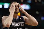 BOSTON, MA - JANUARY 03:  Kevin Love #42 of the Minnesota Timberwolves wipes his face in the fourth quarter against the Boston Celtics on January 3, 2011 at the TD Garden in Boston, Massachusetts. The Celtics defeated the Timberwolves 96-93. NOTE TO USER: User expressly acknowledges and agrees that, by downloading and/or using this Photograph, User is consenting to the terms and conditions of the Getty Images License Agreement.  (Photo by Elsa/Getty Images)