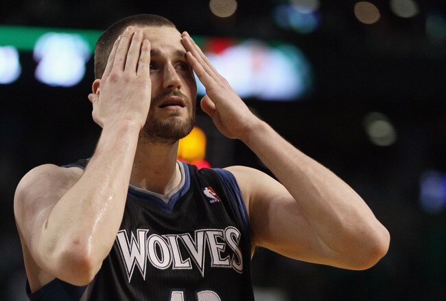 BOSTON, MA - JANUARY 03:  Kevin Love #42 of the Minnesota Timberwolves wipes his face in the fourth quarter against the Boston Celtics on January 3, 2011 at the TD Garden in Boston, Massachusetts. The Celtics defeated the Timberwolves 96-93. NOTE TO USER: User expressly acknowledges and agrees that, by downloading and/or using this Photograph, User is consenting to the terms and conditions of the Getty Images License Agreement.  (Photo by Elsa/Getty Images)