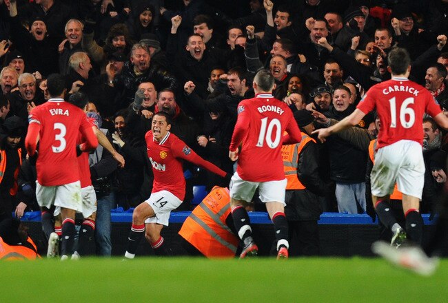 LONDON, ENGLAND - FEBRUARY 05:  Javier Hernandez of Manchester United (14) celebrates with team mates as he scores their third goal with a header during the Barclays Premier League match between Chelsea and Manchester United at Stamford Bridge on February 5, 2012 in London, England.  (Photo by Mike Hewitt/Getty Images)