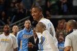 DENVER, CO - MARCH 23:  J.R. Smith #5 of the Denver Nuggets celebrates after scoring against the San Antonio Spurs to give the Nuggets their first lead of the game 99-98 in the fourth quarter at the Pepsi Center on March 23, 2011 in Denver, Colorado. The Nuggets defeated the Spurs 115-112. NOTE TO USER: User expressly acknowledges and agrees that, by downloading and or using this photograph, User is consenting to the terms and conditions of the Getty Images License Agreement.  (Photo by Doug Pensinger/Getty Images)