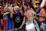 MONACO - AUGUST 26:  FC Barcelona fans cheer prior to the start of the UEFA Super Cup match between FC Barcelona and FC Porto at Louis II Stadium on August 26, 2011 in Monaco, Monaco.  (Photo by Jasper Juinen/Getty Images)