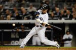 NEW YORK, NY - OCTOBER 06:  Nick Swisher #33 of the New York Yankees steps up to the plate to bat against the Detroit Tigers during Game Five of the American League Championship Series at Yankee Stadium on October 6, 2011 in the Bronx borough of New York City.  (Photo by Patrick McDermott/Getty Images)