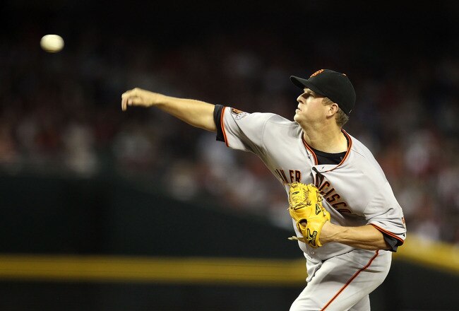 PHOENIX, AZ - SEPTEMBER 23:  Starting pitcher Matt Cain #18 of the San Francisco Giants pitches against the Arizona Diamondbacks during the Major League Baseball game at Chase Field on September 23, 2011 in Phoenix, Arizona.  (Photo by Christian Petersen/Getty Images)