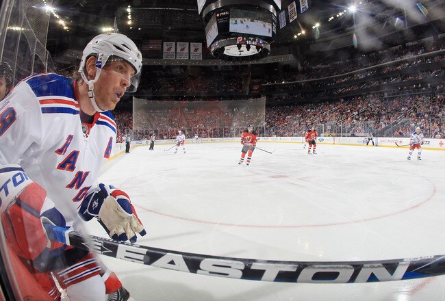 NEWARK, NJ - JANUARY 31: Brad Richards #19 of the New York Rangers skates against the New Jersey Devils at the Prudential Center on January 31, 2012 in Newark, New Jersey. The Devils defeated the Rangers 4-3 in the shootout. (Photo by Bruce Bennett/Getty Images)