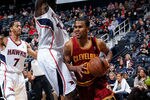 ATLANTA, GA - JANUARY 21:  Ramon Sessions #3 of the Cleveland Cavaliers drives against Jannero Pargo #7 and Ivan Johnson #44 of the Atlanta Hawks at Philips Arena on January 21, 2012 in Atlanta, Georgia.  NOTE TO USER: User expressly acknowledges and agrees that, by downloading and or using this photograph, User is consenting to the terms and conditions of the Getty Images License Agreement.  (Photo by Kevin C. Cox/Getty Images)